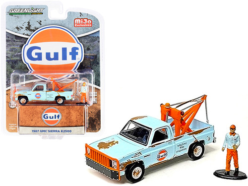 1987 GMC Sierra K2500 Tow Truck Matt Light Blue (Weathered) with Male Figurine "Gulf Oil" 1/64 Diecast Model Car by Greenlight