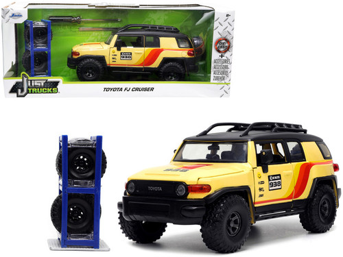Toyota FJ Cruiser #938 Cream with Matt Black Top with Roof Rack and Stripes "KC Hilites" with Extra Wheels "Just Trucks" Series 1/24 Diecast Model Car by Jada