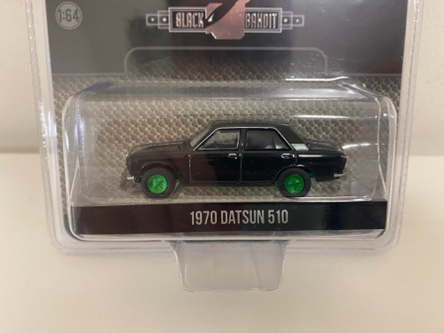 CHASE CAR 1970 Datsun 510 4-Door Sedan "Black Bandit" (Black with Green Wheels) Series 22 1/64 Diecast Model Car by Greenlight