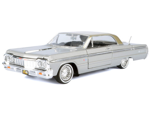 1964 Chevrolet Impala Lowrider Hard Top Silver Metallic with Gold Metallic Top "Get Low" Series 1/24 Diecast Model Car by Motormax 1964 Chevrolet Impala Lowrider Hard Top Silver Metallic with Gold Metallic Top "Get Low" Series 1/24 Diecast Model Car by Motormax