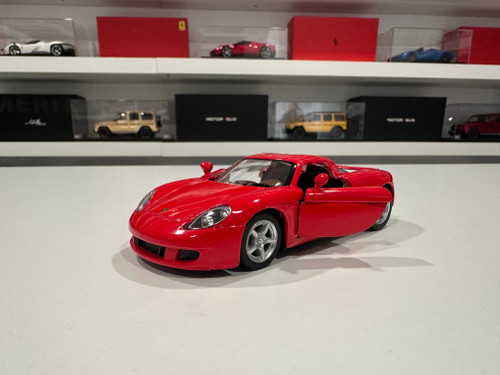 1/36 Kinsmart Porsche Carrera GT (Red) Diecast Car Model (brand new no retail box) 1/36 Kinsmart Porsche Carrera GT (Red) Diecast Car Model (brand new no retail box)