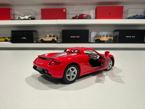1/36 Kinsmart Porsche Carrera GT (Red) Diecast Car Model (brand new no retail box) 1/36 Kinsmart Porsche Carrera GT (Red) Diecast Car Model (brand new no retail box)