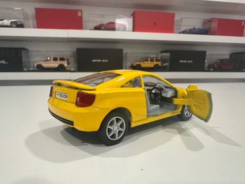 1/34 Kinsmart Toyota Celica (Yellow) Diecast Car Model (new no retail box) 1/34 Kinsmart Toyota Celica (Yellow) Diecast Car Model (new no retail box)