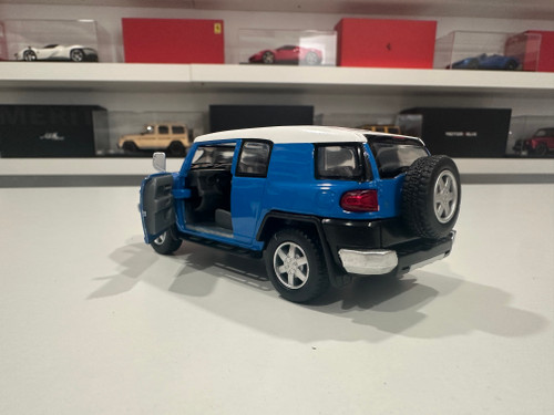 1/36 Kinsmart Toyota FJ Cruiser (Blue) 4.6" Diecast Car Model (new no retail box) 1/36 Kinsmart Toyota FJ Cruiser (Blue) 4.6" Diecast Car Model (new no retail box)