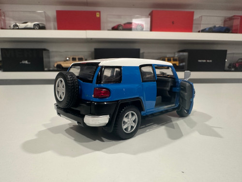 1/36 Kinsmart Kinsmart Toyota FJ Cruiser (Blue) 4.6" Diecast Car Model (new no retail box) 1/36 Kinsmart Kinsmart Toyota FJ Cruiser (Blue) 4.6" Diecast Car Model (new no retail box)