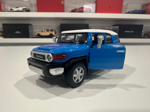 1/36 Kinsmart Kinsmart Toyota FJ Cruiser (Blue) 4.6" Diecast Car Model (new no retail box) 1/36 Kinsmart Kinsmart Toyota FJ Cruiser (Blue) 4.6" Diecast Car Model (new no retail box)