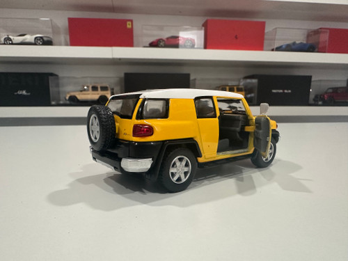 1/36 Kinsmart Kinsmart Toyota FJ Cruiser (Yellow) 4.6" Diecast Car Model (new no retail box) 1/36 Kinsmart Kinsmart Toyota FJ Cruiser (Yellow) 4.6" Diecast Car Model (new no retail box)