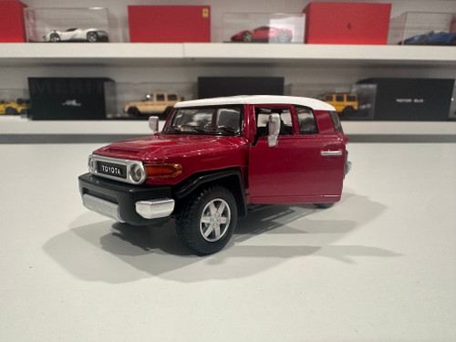 1/36 Kinsmart Kinsmart Toyota FJ Cruiser (Red) 4.6" Diecast Car Model (new no retail box) 1/36 Kinsmart Kinsmart Toyota FJ Cruiser (Red) 4.6" Diecast Car Model (new no retail box)