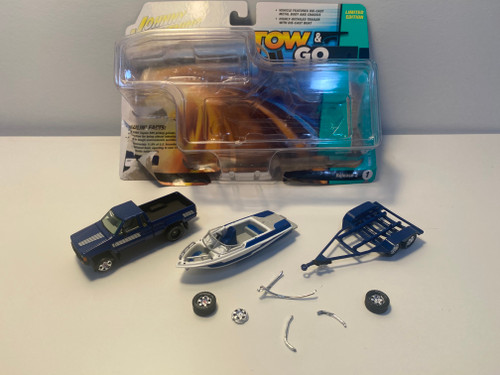 DAMAGED OPEN BOX AS-IS 1/64 Johnny Lightning 1985 Toyota SR5 Pickup with Malibu Speed Boat Trailer (Blue) Diecast Models DAMAGED OPEN BOX AS-IS 1/64 Johnny Lightning 1985 Toyota SR5 Pickup with Malibu Speed Boat Trailer (Blue) Diecast Models