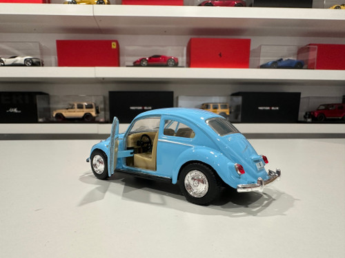 1/32 Kinsmart 1967 Volkswagen Beetle Pastel Solid Colors 5″ (Blue) Diecast Car Model (new no retail box) 1/32 Kinsmart 1967 Volkswagen Beetle Pastel Solid Colors 5″ (Blue) Diecast Car Model (new no retail box)