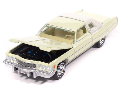1976 Cadillac Coupe DeVille Phoenician Ivory "Luxury Cruisers" Series 1/64 Diecast Model Car by Auto World