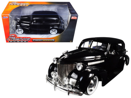 1939 Chevrolet Master Deluxe Black with baby Moon Wheels "Showroom Floor" 1/24 Diecast Model Car by Jada