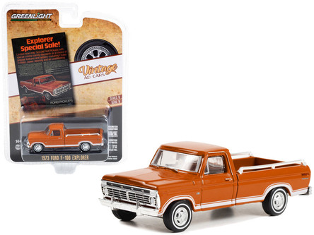 に 1973 Ford F-100 Explorer Pickup Truck Orange with White Stripes