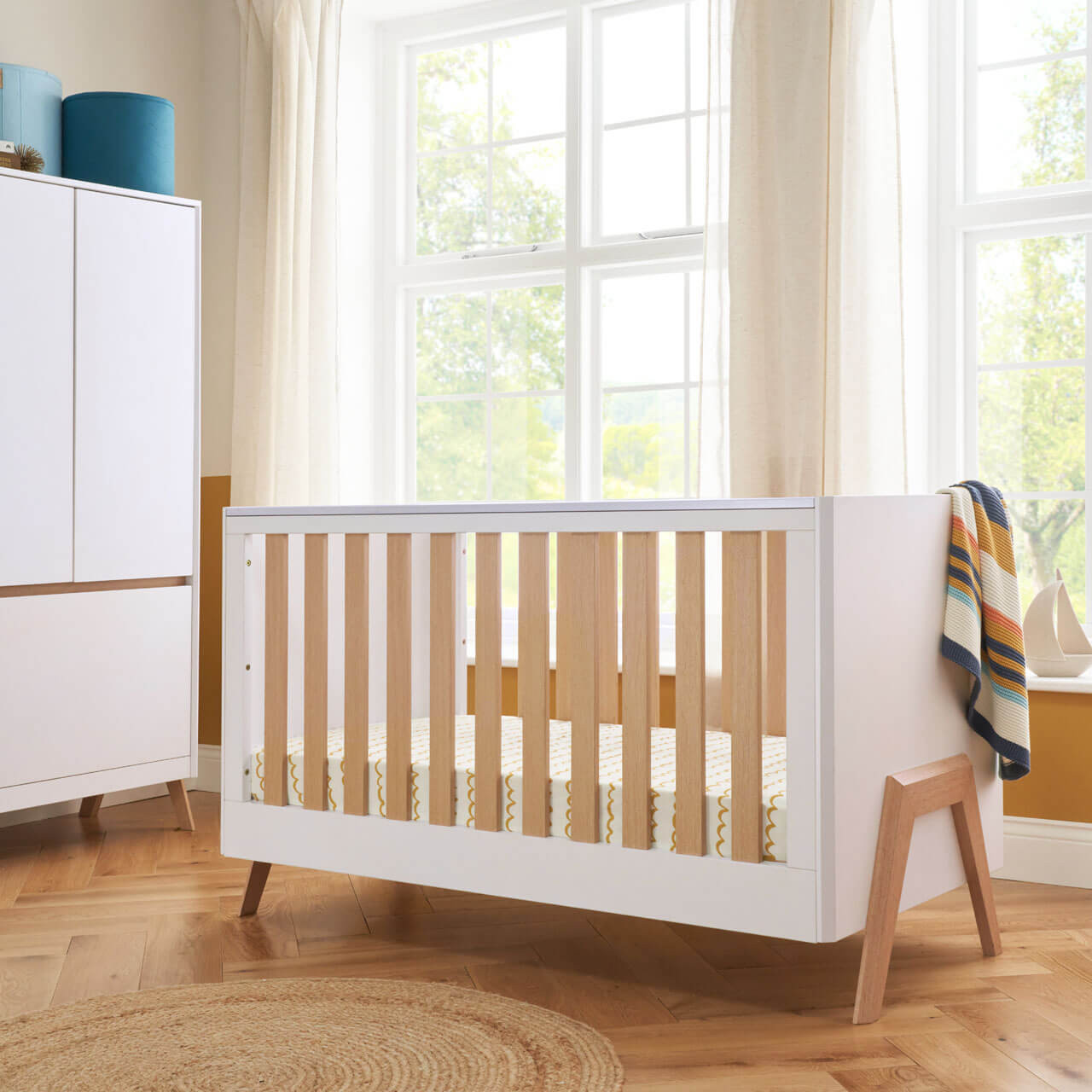 Tutti Bambini Fuori Cot Bed White/Light Oak Winstanleys Pramworld