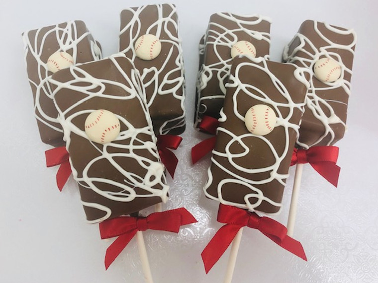 Baseball fanatics will love these baseball fudge brownie pops everywhere.  Send a gift box to someone just in time for game day!  Having a team party with these would be a perfect dessert idea.  Order today!