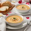 Bowls of creamy king crab bisque for Valentine's dinner enjoyment.