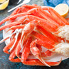 A fresh pile of bright Alaska snow crab legs.