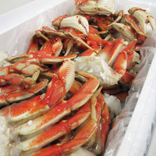 A case of Alaska Dungeness crab legs & claws.