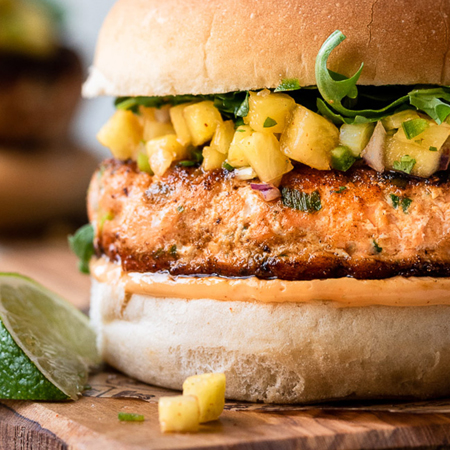 A delicious & juicy Thai style salmon burger with pineapple salsa