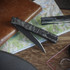 Ocaso Solstice, CPM S35VN Straight Back Blade, Flipper Liner Lock, Laser Engraved Topo Titanium Handle, Black PVD blade 
