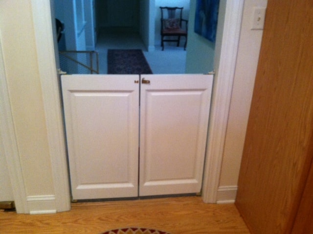 Dog gate for sliding clearance glass door