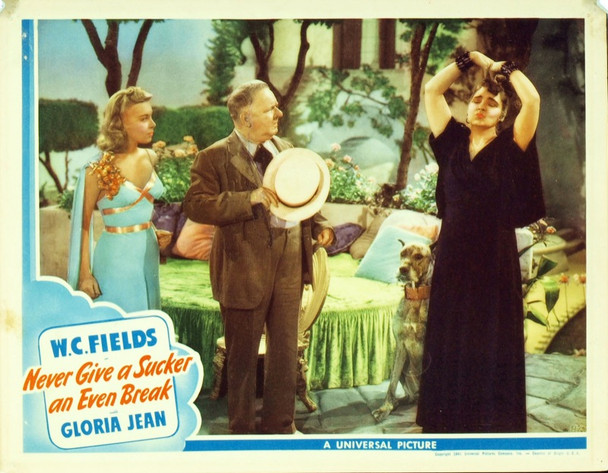 NEVER GIVE A SUCKER AN EVEN BREAK (1941) 16235 Original Universal Pictures Scene Lobby Card (11x14).  Fine condition.