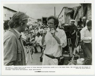 UNDER FIRE (1983) 19303 Gelatin Silver Print  Set photography of director Roger Spottiswoode  Very Fine