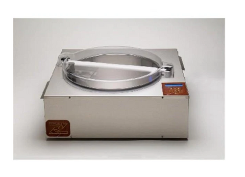 The Revolation 3Z is ChocoVision’s highest-capacity tabletop tempering machine, designed for operations that require substantial throughput with precise, repeatable control. It processes up to 30 pounds of chocolate per batch, or 45 pounds with the holey baffle (included), and can maintain temper for over 15 hours, supporting high-volume production throughout the day. Like the Revolation V and Delta, the Revolation 3Z uses the same advanced microprocessor control system, precisely tempering and holding chocolate within ±0.2°F to ensure consistent temper, excellent appearance, and optimal texture. Capable of producing 150 pounds or more of tempered chocolate per day with minimal maintenance, the Revolation 3Z delivers industrial-level output in a tabletop format, using ChocoVision’s forced hot air heating system—no light bulbs and no hot water baths—for efficient, long-term reliability.