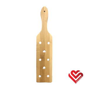 A photo of the Dreamers Signature Bamboo Paddle - Small A photo of the Dreamers Signature Bamboo Paddle - Small