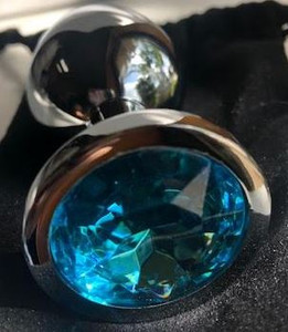 A photo of the Dreamers Signature Stainless Steel Anal Plug with Blue Diamond - Medium