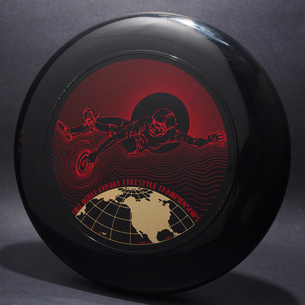 1982 World Freestyle Frisbee Championships Austin TX Black w/ Red Matte and Metallic Gold - T80 - Top View