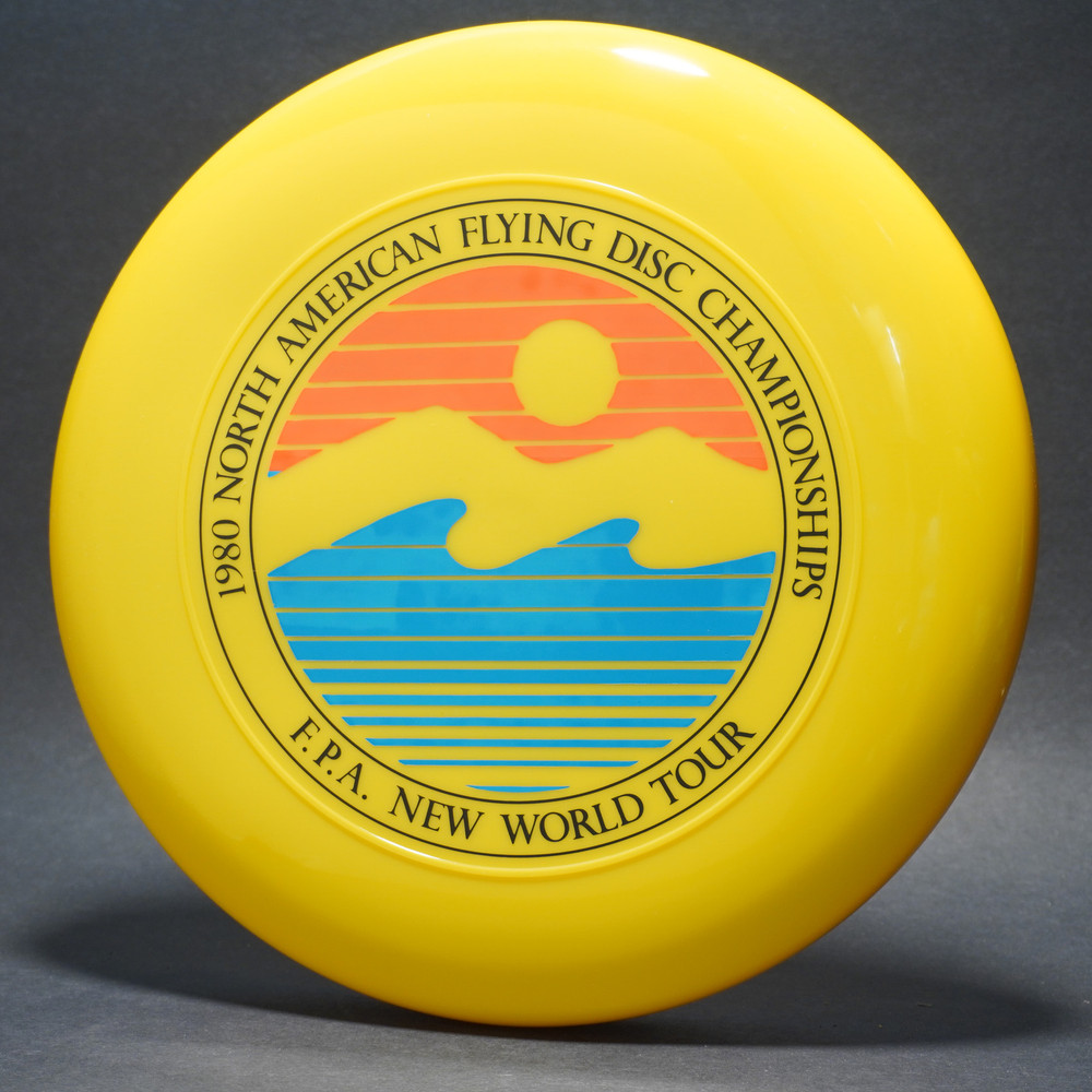 Sky-Styler FPA 1980 NA Flying Disc Championships Yellow w/ Black Matte, Blue Matte, and Red Matte - TR - Top View