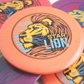 Innova STAR LION - INNFUSE GRAPHICS Mid-Range Golf Disc - view of many color variation spread on table