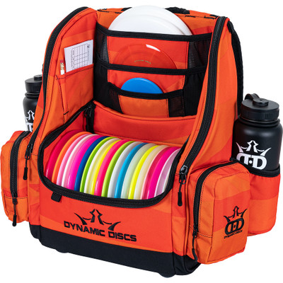 Dynamic Discs COMMANDER BACKPACK Disc Golf Bag -  Infrared Orange color. Shows a fully-loaded Commander bag with full capacity of discs, putters in the upper pockets and water bottles in the side compartments.