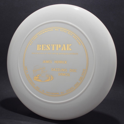 James Herrick Dazzling Disc Demos sponsor BestPak White w/ Metallic Gold Top View Black Background