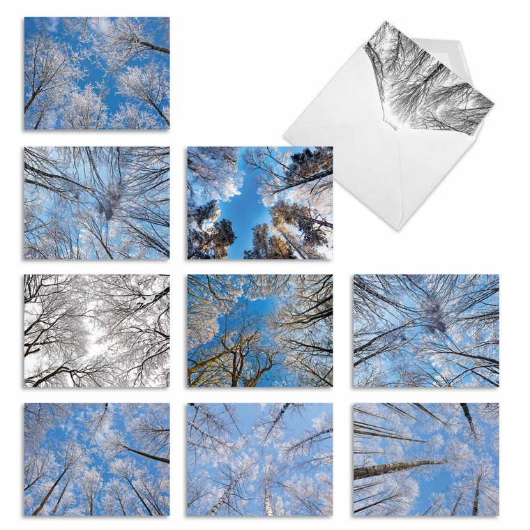 Snowy tree tops inside of a forest bring holiday cheer to gift card recipients