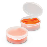 A silicone straw in an orange colour, housed in a transparent case, partially open to reveal the straw inside.