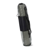 A rolled-up Zen Yoga Mat is featured in a mesh carrying bag, showcasing its compact and portable design.