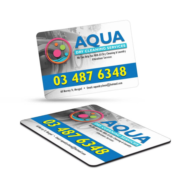 A rectangular drink bottle with a vibrant design and a logo, featuring contact information for a dry cleaning service.