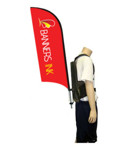 A red single-sided wing banner attached to a black backpack, displayed on a mannequin.