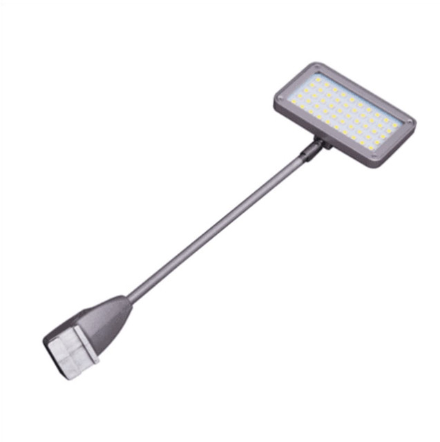 A rectangular LED light with a flexible arm and a black finish. The light features a grid of small LED bulbs.