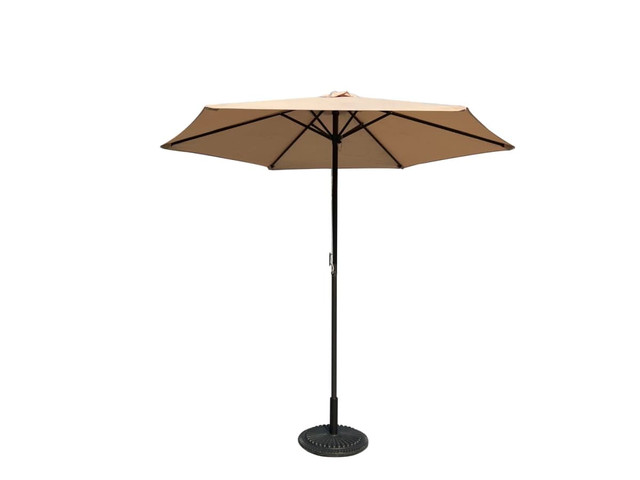 A café umbrella in a tan colour with a black pole and base, featuring eight ribs for support.