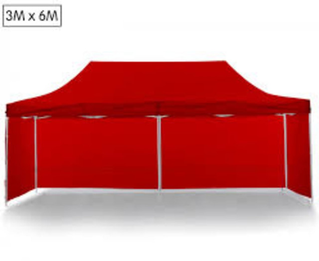 A red 6m x 3m marquee frame and canopy, featuring a sleek structure and a large canopy area.
