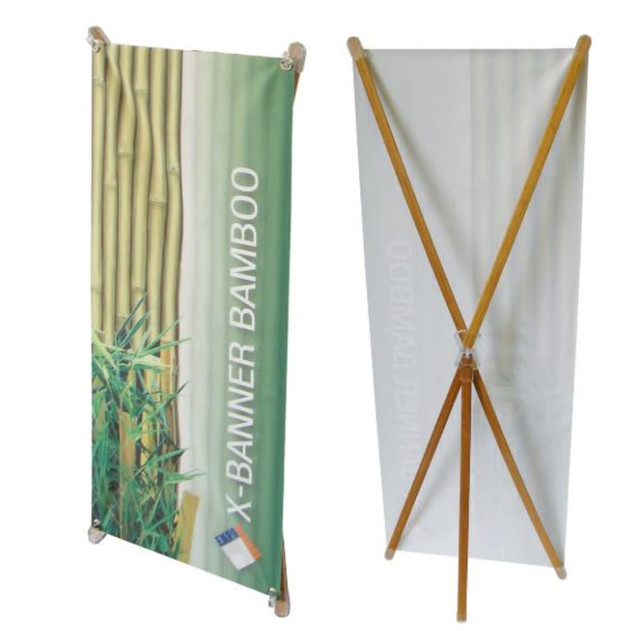 A Bamboo X-Banner featuring a bamboo design and a wooden frame, displayed upright in two orientations.