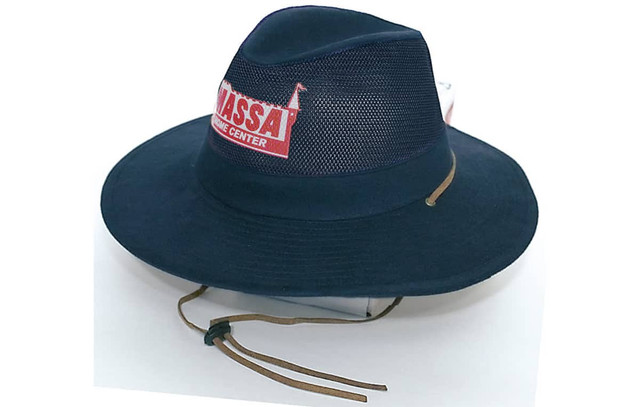 A collapsible cotton twill and soft mesh hat in navy blue, featuring a logo on the front and chin straps.