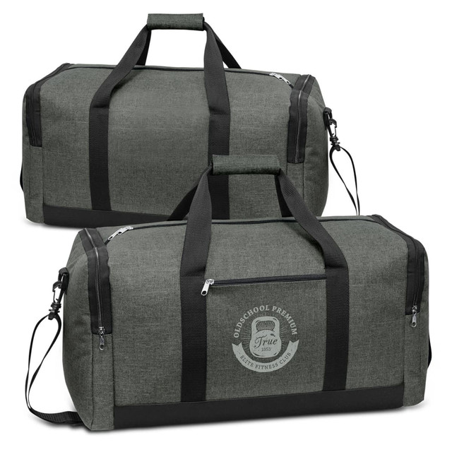 A green duffle bag featuring a logo, with black straps and zippers, designed for various uses.