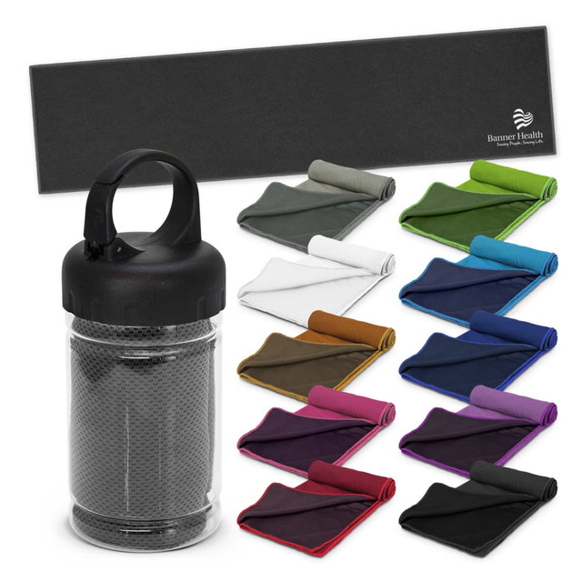 A black tube containing a grey cooling towel, with multiple folded towels in various colours displayed around it.