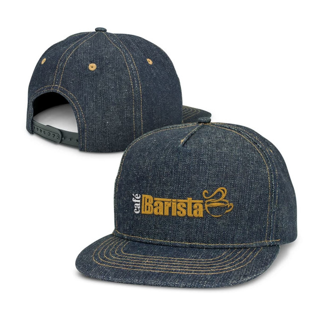 A denim flat peak cap featuring a logo, with a darker blue colour and contrasting stitching.