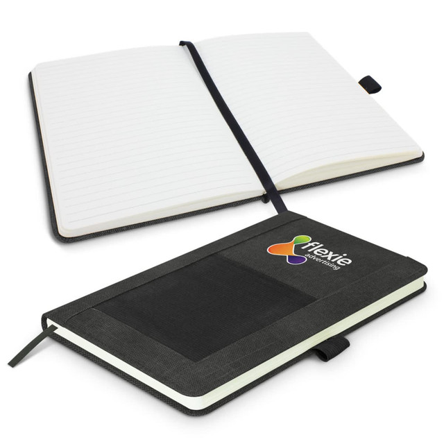 A green Princeton Notebook with a textured cover and an elastic band, featuring blank pages inside.