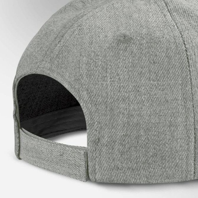 A grey cap with a textured fabric and an adjustable strap at the back. It features a logo.